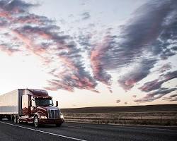 Gambar Truck driving on a smooth road