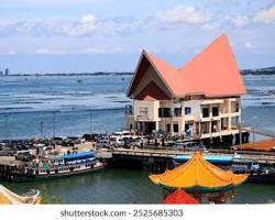 Image of Koh Loi with colorful houses and the pier