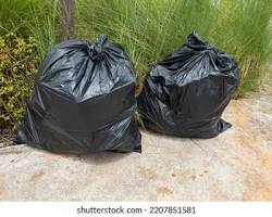 Image of neatly tied garbage bags