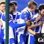 Wigan's Will Grigg stuns Manchester