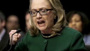 Image result for hillary clinton with gaddafi son