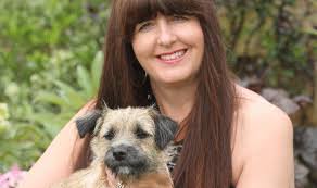 Terrified owner Clare Callard feared the worst as the eight-month-old border terrier disappeared over the edge. But luckily the tide was in and a walker ... - lola-owner-dog-rescued-se-404131