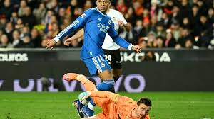 Real Madrid edge Valencia to stay on Barca's tail, Atletico slump