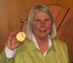 Susan Gregory, deputy director of the Lawrence Hall of Science, displays Ernest O. Lawrence&#39;s Nobel gold medal after it was returned to the hall Wednesday ... - medal