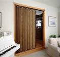 Sliding accordion door