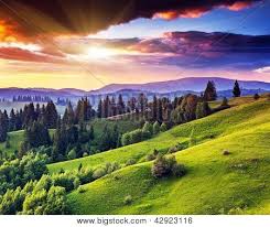 Resultado de imagen de puesta de sol en la montaña