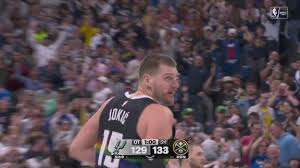 Jokic splashes a shot over Wemby in OT