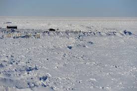 An 80-mile crack splits Lake Erie's ice as the lake nears a rare milestone