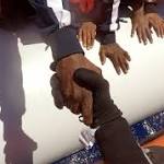 migrants rescued Mediterranean: Italian coastguard