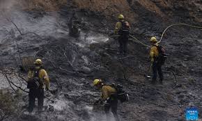 Fast-moving wildfire in US Southern California forces evacuations