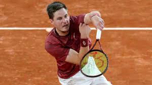Hot Shot: Patten is all over the net in Madrid doubles final