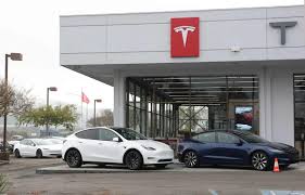 HSBC Warns Tesla Stock Could Plunge 70% Amidst FSD Concerns