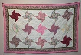 Résultat de recherche d'images pour "pinwheel quilt patterns"