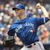 Happ gets career-high 13th win, Blue Jays beat Mariners 2-0