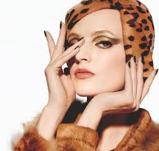 Christian Dior may be ultimately credited for “The New Look” but the leopard print has been a signature of the French maison since the beginning. - dior_junglefever_fall2012