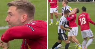 Fans outraged as Dan Burn elbow on Luke Shaw goes unpunished: 'If that was Casemiro it would've been a direct red card'