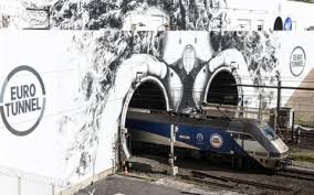 Two airlifted to hospital after bus collides with train stopped on French side of Channel Tunnel — BBC