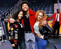 Kelly Oubre Jr. with his siblings