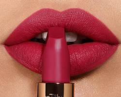 Applying lipstick