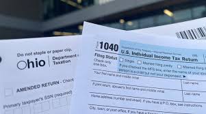 Some Ohioans will get larger refunds because of Trump tax cuts; IRS eliminates paper refund checks