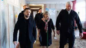 город