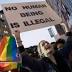 Anti-Trump protesters march by tens of thousands nationwide
