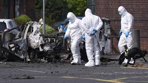 Who is the 'incredibly brave' car bomb hijacking victim praised by police chief?