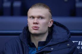 Man City wins after dropping Haaland and Liverpool loses on stoppage-time goal