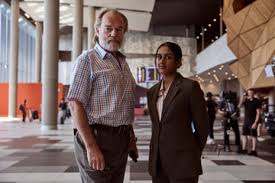 The Airport Chaplain review - thoroughly bingeable TV about 'Batman in a hi-vis vest' - The Guardian