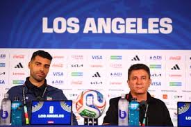 Iran’s footballers arrive in US amid peace deal but admit tension ‘undermines joy’