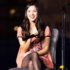 Olivia Rodrigo performing during her Unraveled Tour
