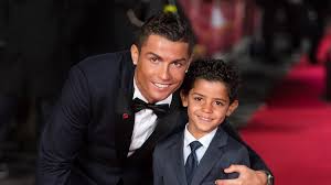 Image result for PIC OF RONALDO WITH HIS SON/MESSI WITH HIS SON