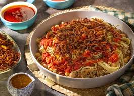 دخل مصر مع الاحتلال و4 مكونات جعلته الأكلة الشعبية الأولى.. قصة الكشري بعد إدراجه في تراث اليونسكو