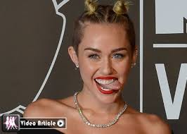 Miley Cyrus Performs &quot;We Can&#39;t Stop&quot; with a Band of Little People on German TV: Watch Here! - mc982013-sp_0