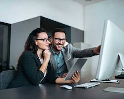 person calculating profit margins resmi