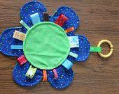 Résultat de recherche d'images pour "taggy blanket"