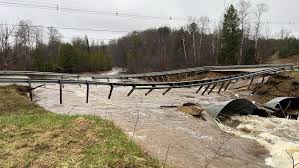 Flooding leads to bridge failure, road closures in Grand Traverse County