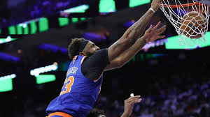 Knicks’ Mitchell Robinson epically dunks over Joel Embiid for instant poster
