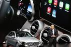 Car makers hold smartphones at bay