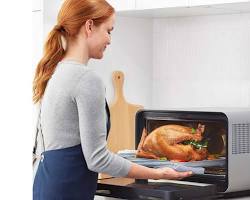 Изображение: smart oven with a touchscreen interface that allows users to select recipes and adjust cooking settings