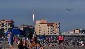 See SpaceX Falcon 9 rocket rise amid sunny skies over Cape Canaveral, Florida