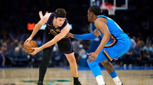 Austin Reaves reacts after injury announcement