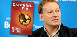 Catching Fire / Simon Beaufoy. Just a couple more months lie between us and the theatrical release of the highly anticipated big screen adaptation of The ... - SimonBeaufoy-catchingfirebooktsr1