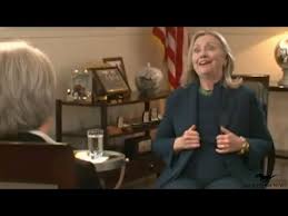 Image result for hillary clinton with gaddafi son