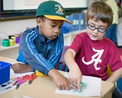 Image of students learning about savings accounts in a classroom