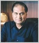 Mr. Rahul Bajaj, Chairman, Bajaj Auto Ltd. holds an Honours Degree in Economics from Delhi University, a degree in Law from Bombay University and an MBA ... - 87782623_LS_Rahul_Bajaj