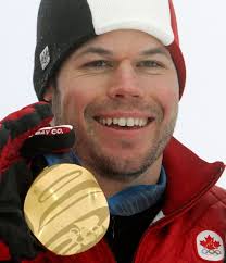 Jasey-Jay Anderson holds his gold medal after winning the men&#39;s parallel giant slalom snowboard final at the Vancouver Winter Olympics at Cypress Mountain ... - anderson17