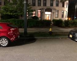 Image of car parked too close to a fire hydrant with a parking ticket