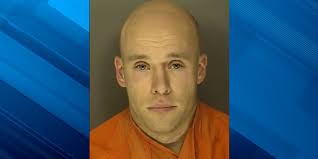 Man Arrested After Pointing Gun at Woman Diverting Traffic Near Vehicle Fire