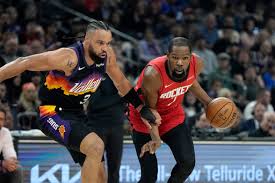 Kevin Durant's juke sends Dillon Brooks to the floor as Rockets rally past Suns for 7th straight win